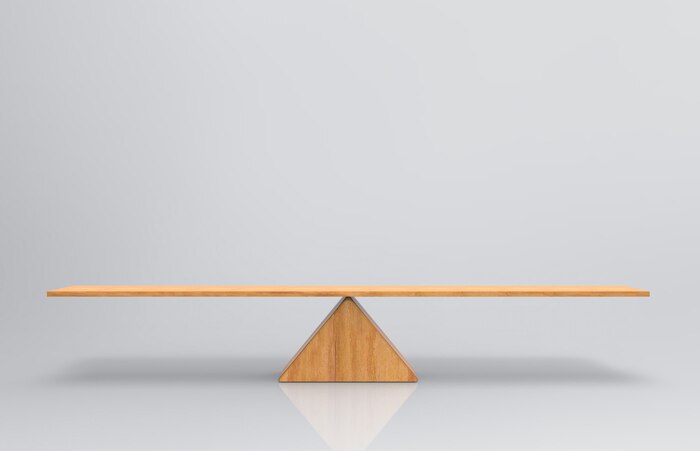 An empty blank wood balance scale on gray background.