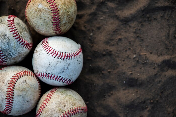 Close-up of dirty baseballs with copy space