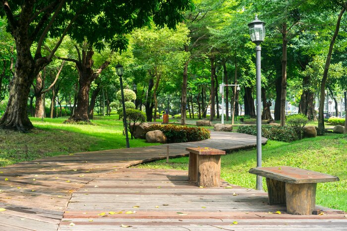 Park with a wooden pathway and benches